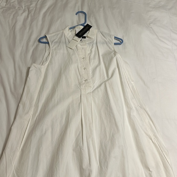 Brand new dress has never been worn, can use a nice wash to brighten it up. - Picture 4 of 7